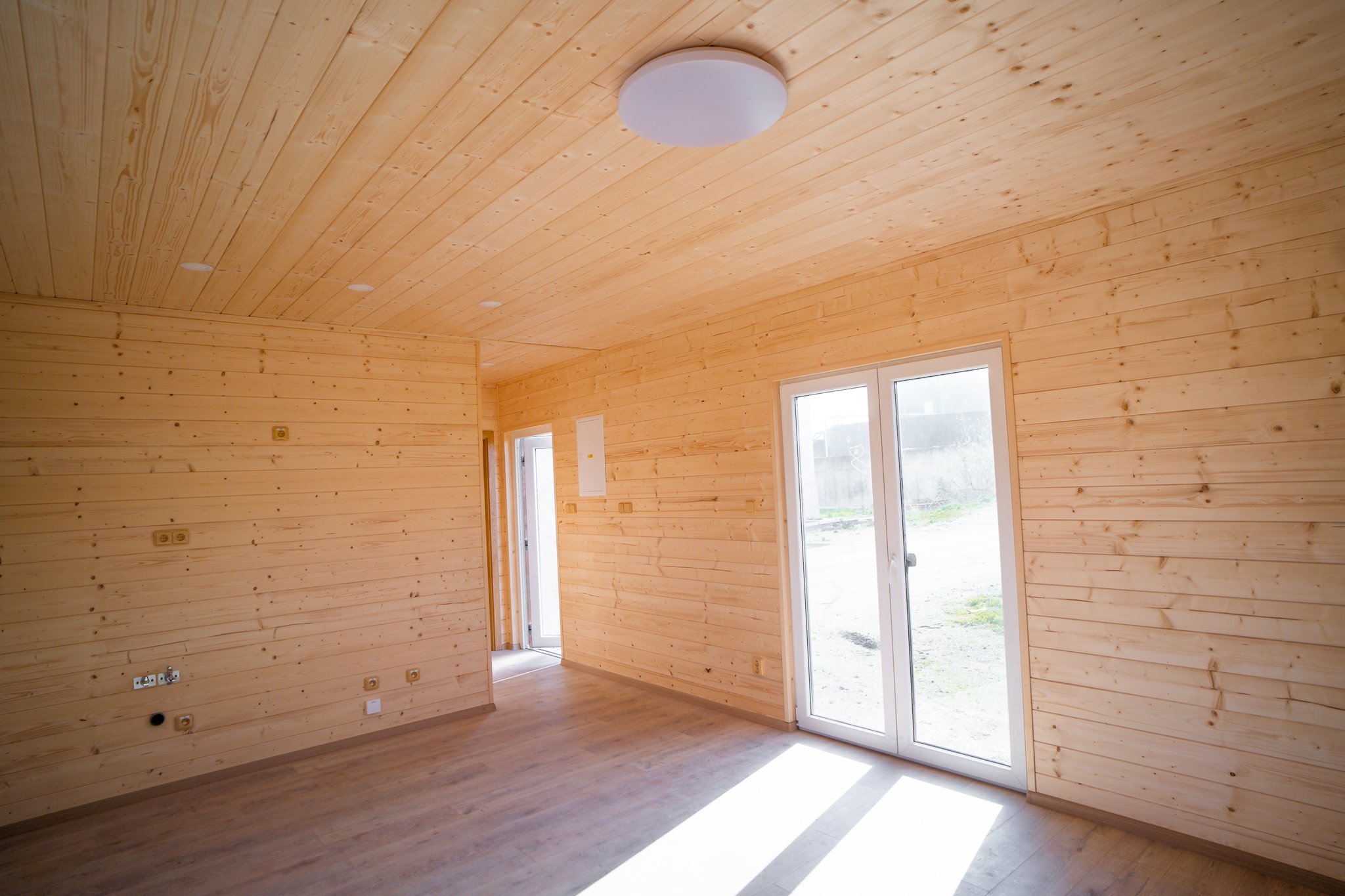 Interiér dřevěného mobilního domu ABODES.